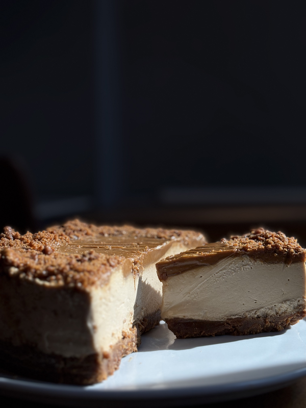 Biscoff cheesecake, full cake side view, lactose-free dessert by NewMoo